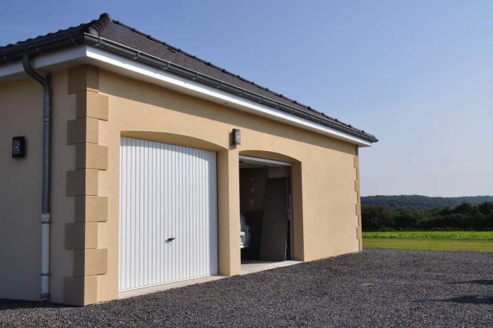 Pose soignée de portes de garage enroulable Trévol